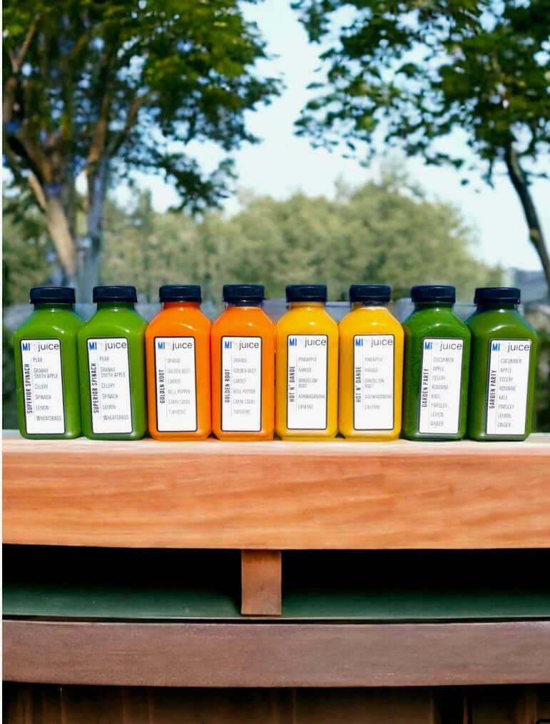 Organic cold-pressed juices in bottles, freshly made, featuring vibrant colors and local produce.