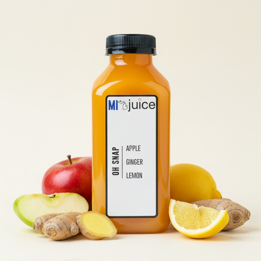 A bottle of MIJUICE labeled 'OH SNAP APPLE GINGER LEMON' with a beige background 
